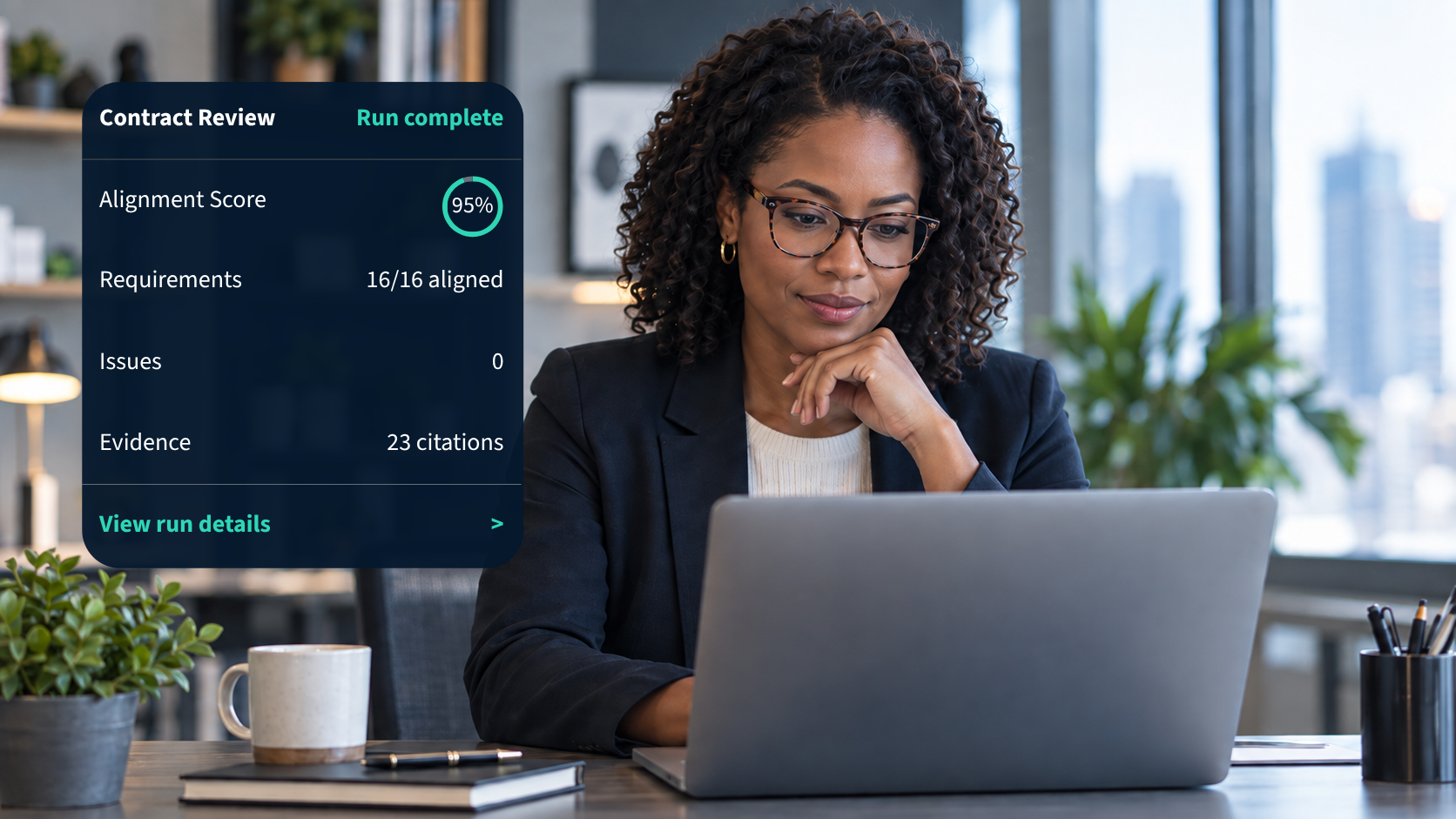 A professional reviewing work with an Assiduity contract review status panel.